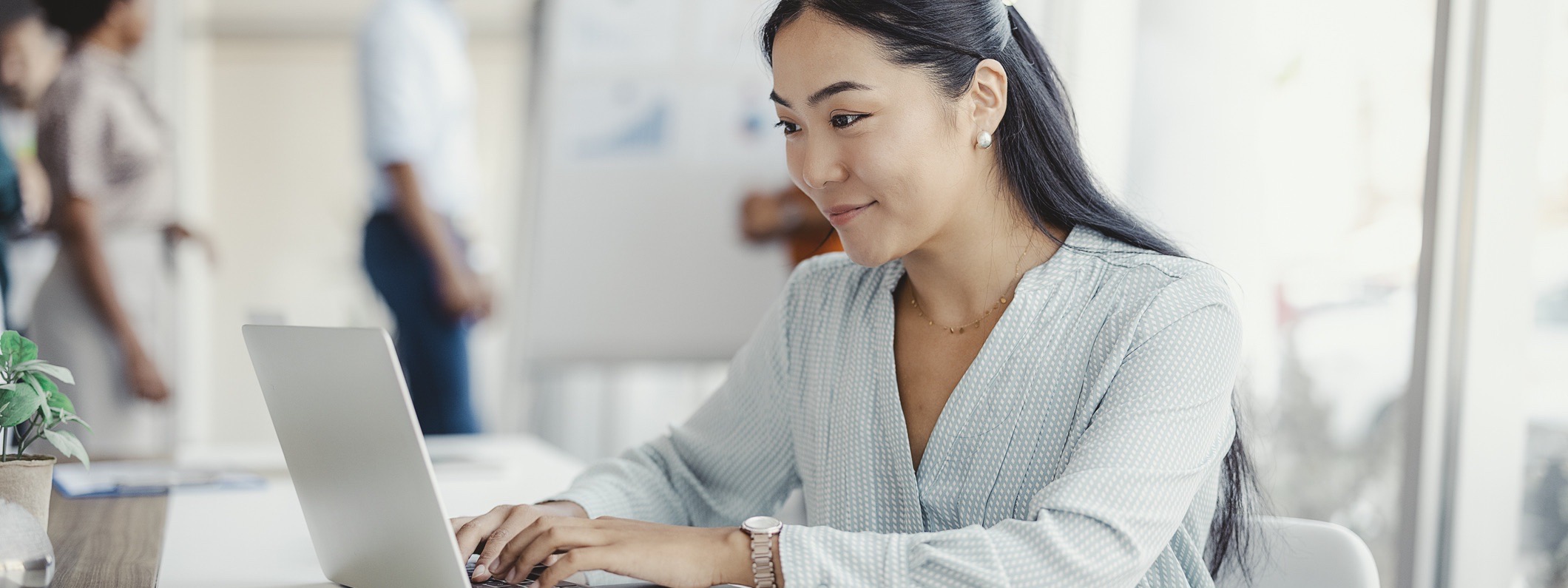 Woman is working on her computer