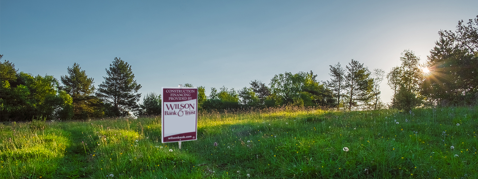 Swift Trust Revolution sign in a land lot